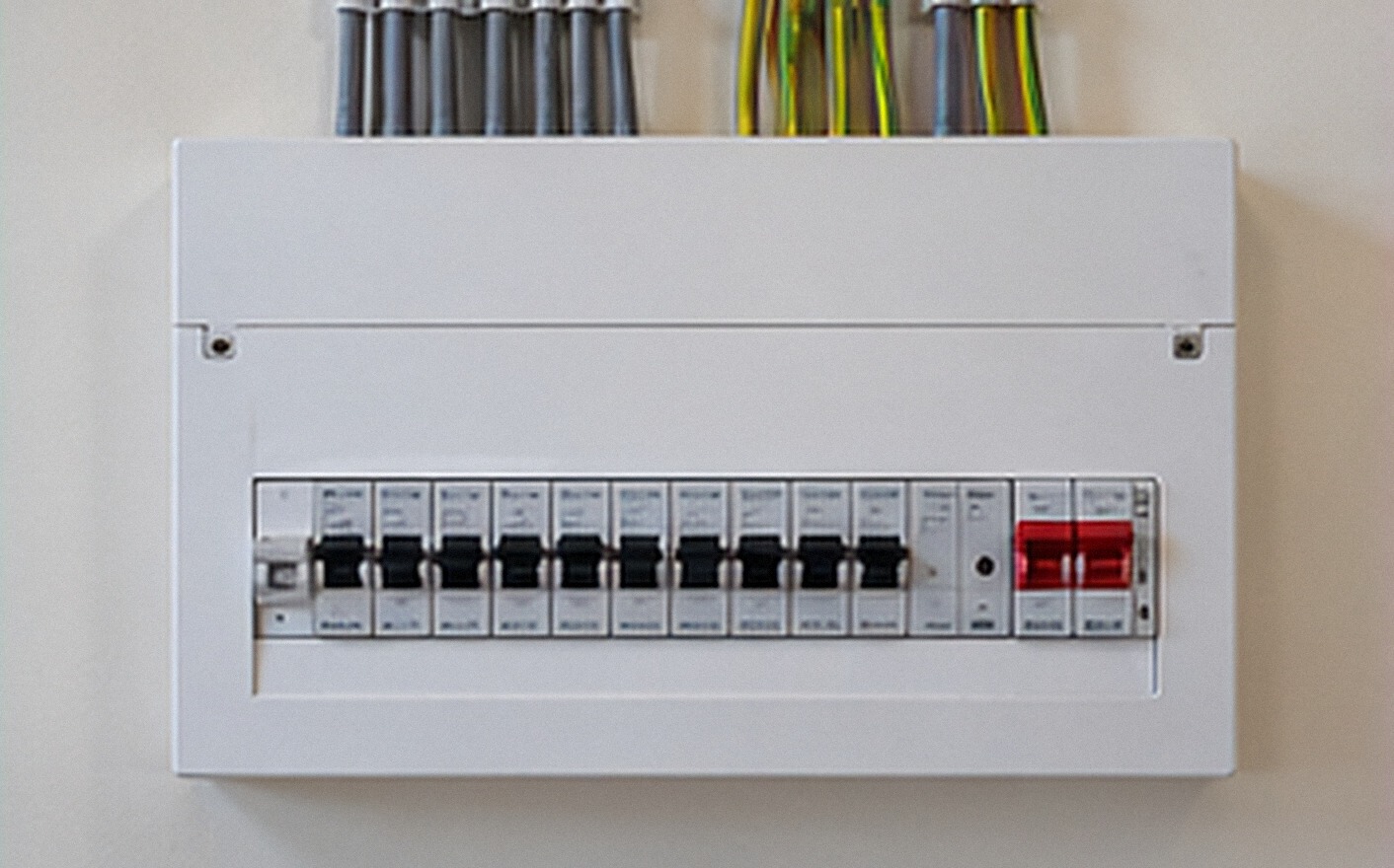 New consumer unit with a neat row of labelled switches